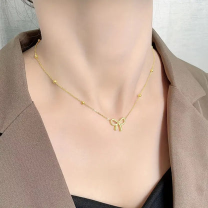 BOW PENDANT NECKLACE