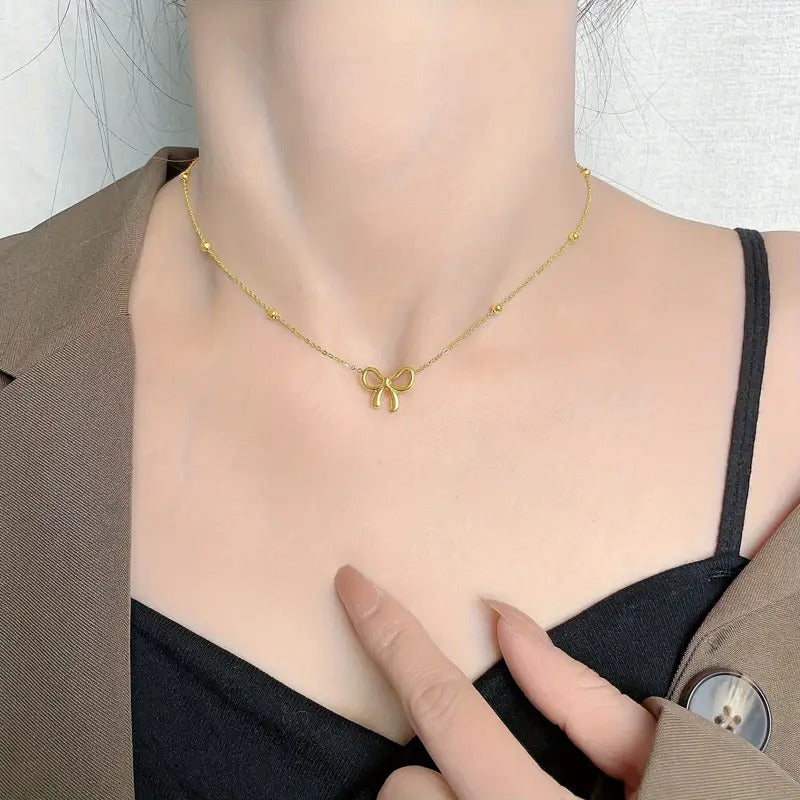 BOW PENDANT NECKLACE