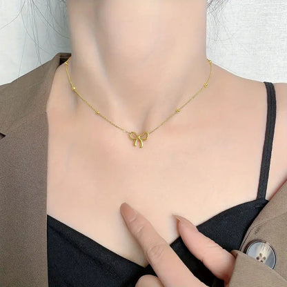 BOW PENDANT NECKLACE