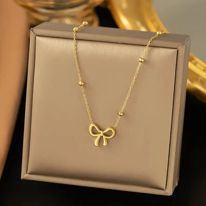 BOW PENDANT NECKLACE