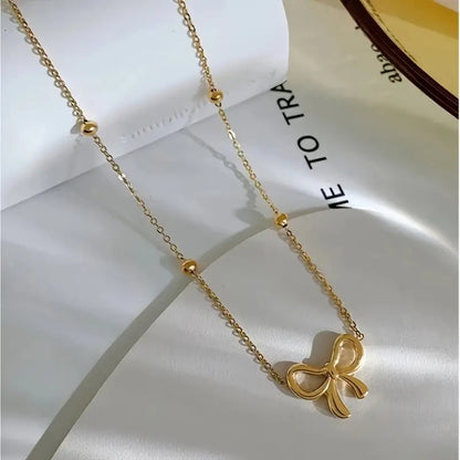 BOW PENDANT NECKLACE